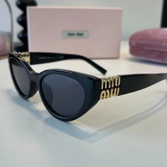 Miu Miu Black Cat-Eye Sunglasses with Gold Temple Detail - Picture 3 of 5